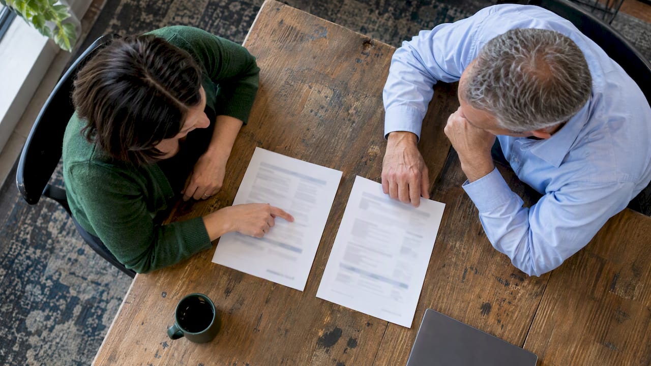 Employer and adviser compare health plan options