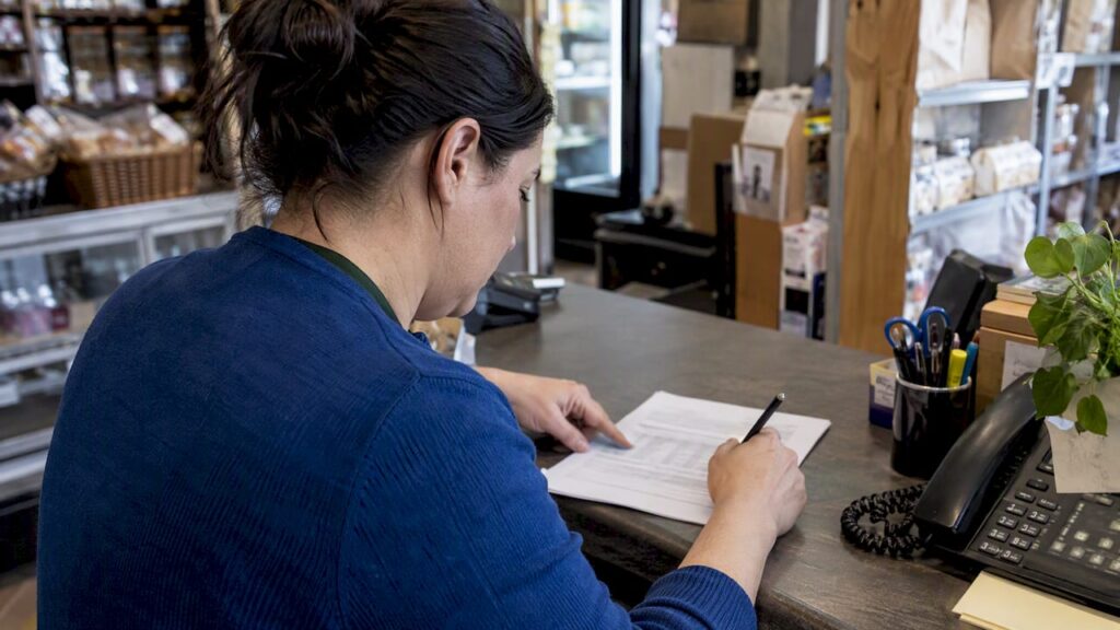 Owner reviewing a sample reconciliation statement